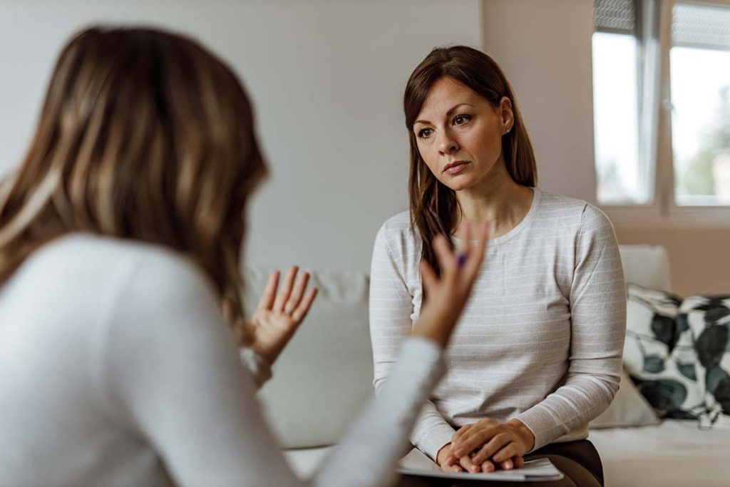 a person talks to a therapist during Xanax Addiction Treatment