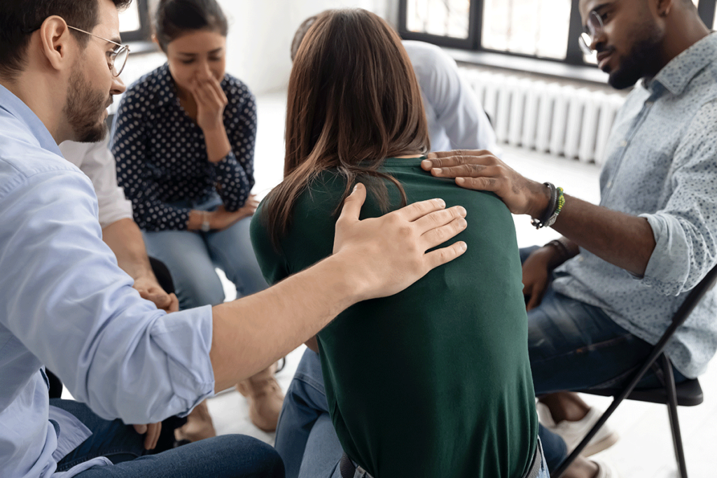 a therapy group provides support to participants in an alcohol detox program