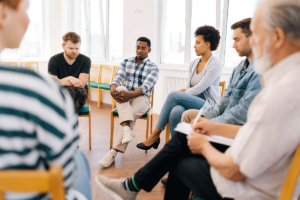 people in group therapy in a drug and alcohol detox center in seattle wa