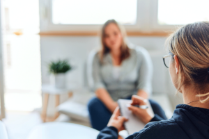 Person talking to their therapist about medical detox