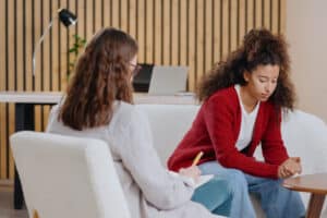 person in therapy learning the importance of mental health treatment