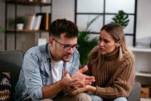 person recognizing signs of bipolar disorder in a loved one and trying to help