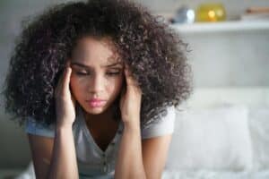 Woman experiencing the link between addiction and depression